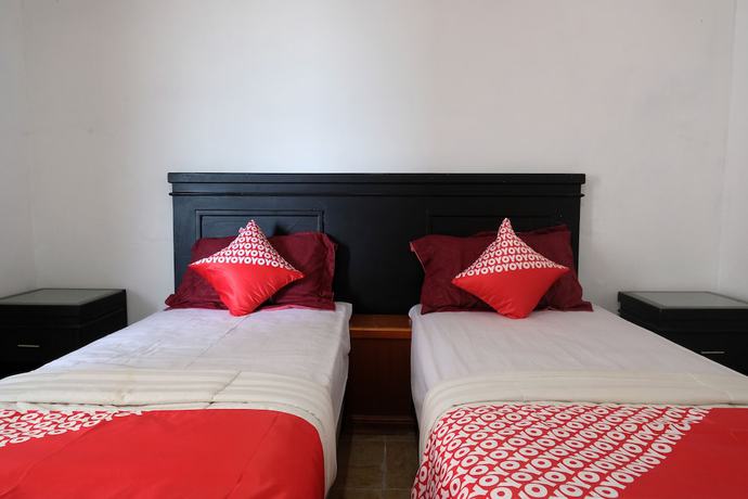 Imagen de la habitación del Hotel OYO 1278 Wina Beach. Foto 3