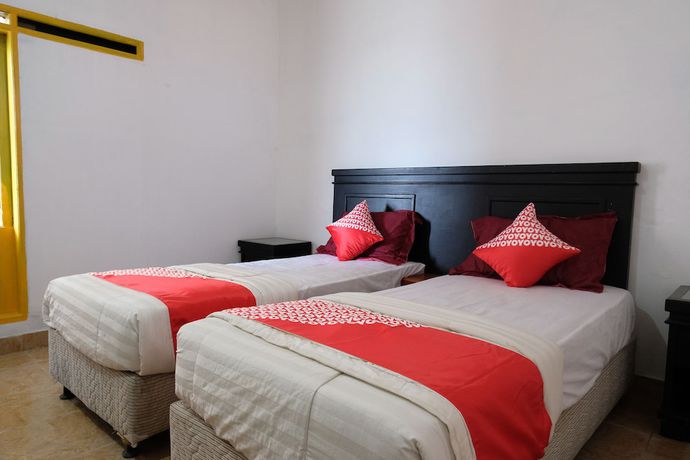 Imagen de la habitación del Hotel OYO 1278 Wina Beach. Foto 4