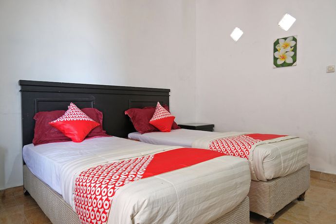 Imagen de la habitación del Hotel OYO 1278 Wina Beach. Foto 9