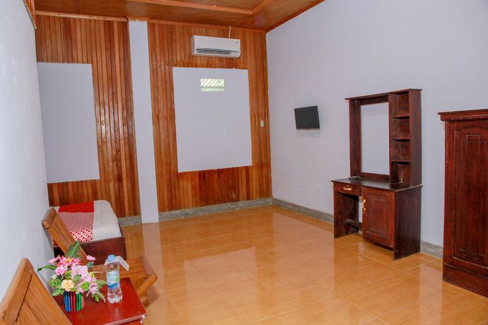 Imagen de la habitación del Hotel OYO 1278 Wina Beach. Foto 10