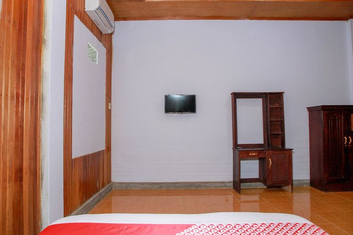 Imagen de la habitación del Hotel OYO 1278 Wina Beach. Foto 12