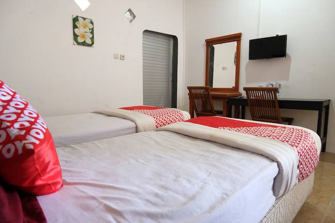 Imagen de la habitación del Hotel OYO 1278 Wina Beach. Foto 13