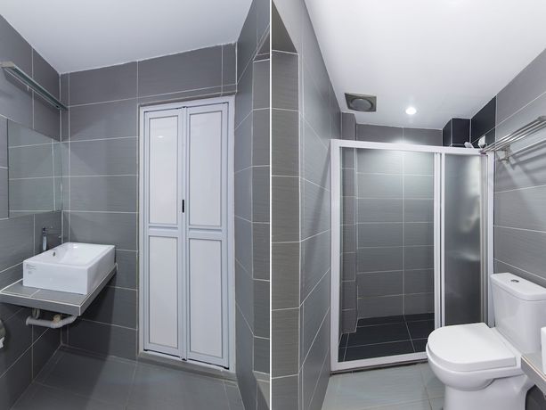 Imagen de la habitación del Hotel OYO 128 Mutiara Suites. Foto 4