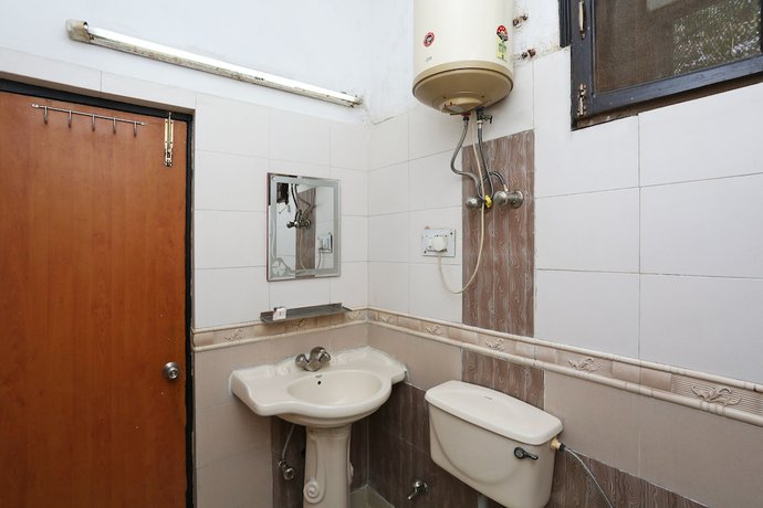 Imagen de la habitación del Hotel OYO 12805 SUNRISE HOUSE. Foto 3