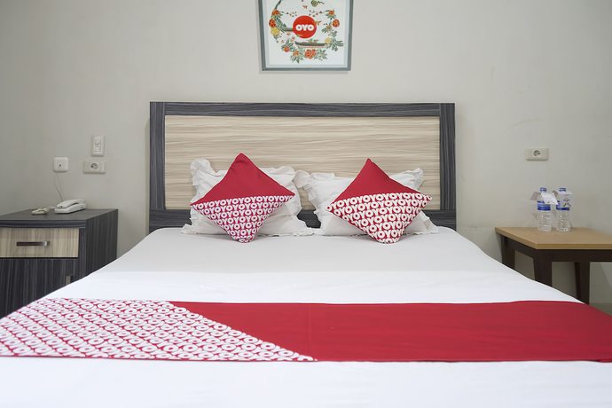 Imagen de la habitación del Hotel OYO 1283 Guest House Loemajan. Foto 4