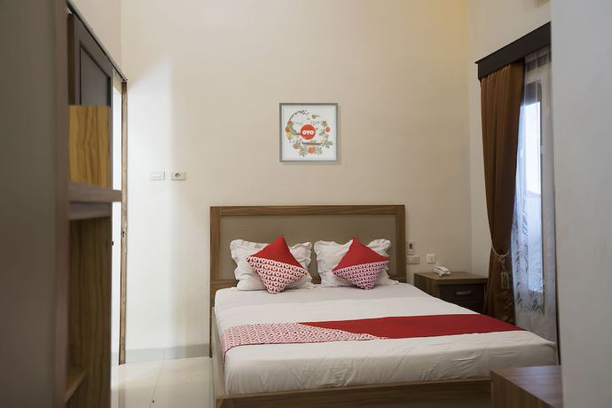 Imagen de la habitación del Hotel OYO 1283 Guest House Loemajan. Foto 10