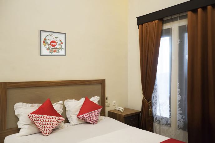 Imagen de la habitación del Hotel OYO 1283 Guest House Loemajan. Foto 11