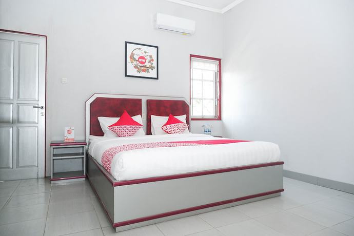 Imagen de la habitación del Hotel OYO 1284 Executive Residence. Foto 14