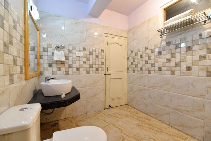 Imagen de la habitación del Hotel OYO 13218 Hollywood. Foto 9