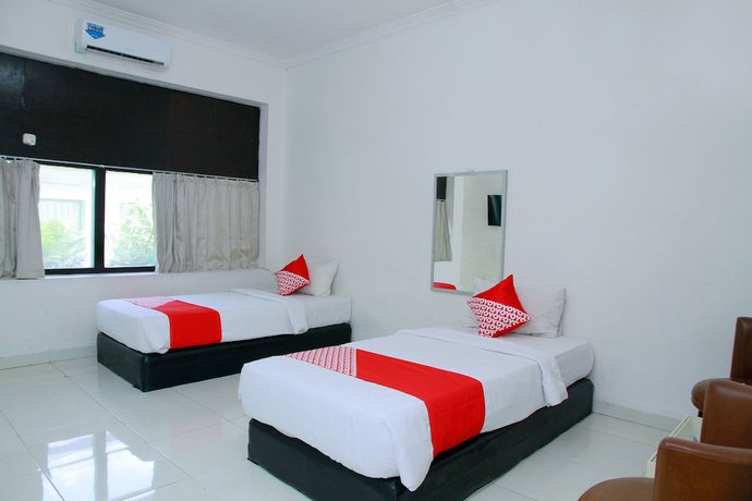 Imagen de la habitación del Hotel OYO 1325 Grand Wisata. Foto 2