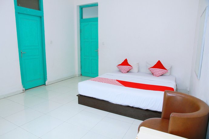 Imagen de la habitación del Hotel OYO 1325 Grand Wisata. Foto 4