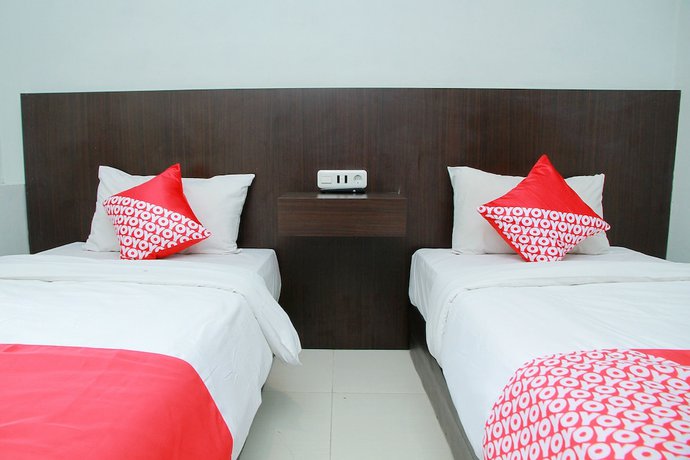 Imagen de la habitación del Hotel OYO 1325 Grand Wisata. Foto 5