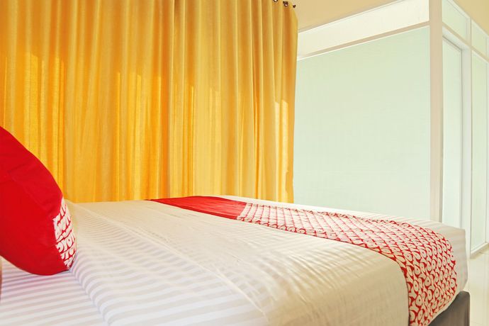 Imagen de la habitación del Hotel OYO 1326 Mahakam Guest House. Foto 3