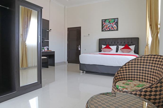 Imagen de la habitación del Hotel OYO 1326 Mahakam Guest House. Foto 5