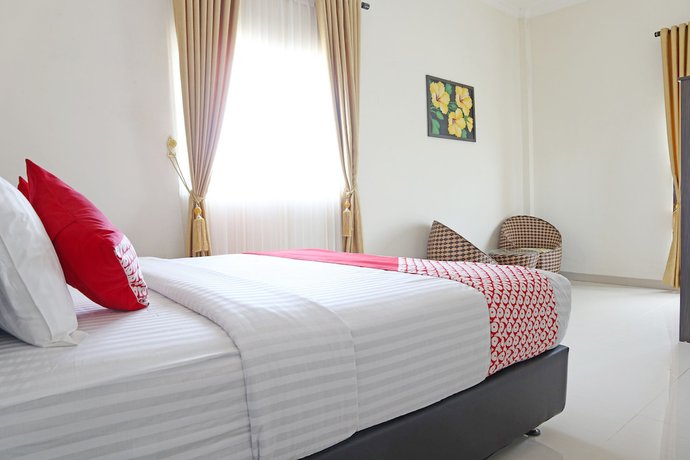 Imagen de la habitación del Hotel OYO 1326 Mahakam Guest House. Foto 7