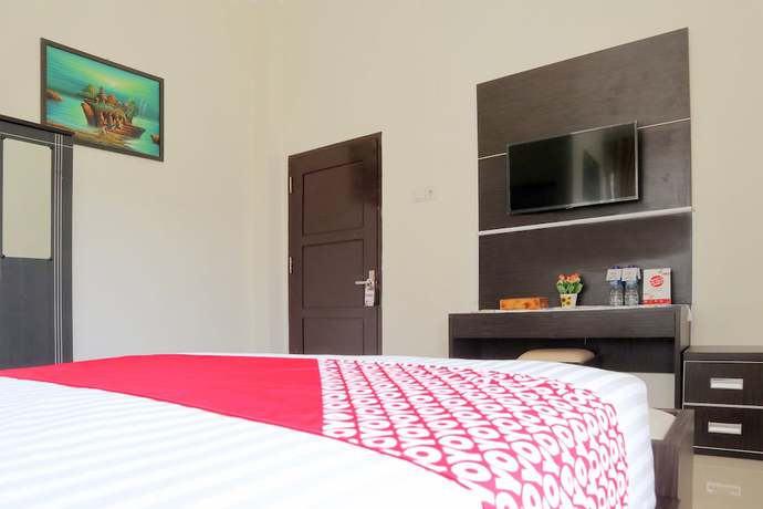 Imagen de la habitación del Hotel OYO 1326 Mahakam Guest House. Foto 15