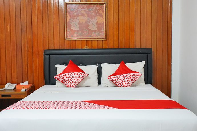 Imagen de la habitación del Hotel OYO 1333 Wisata. Foto 5