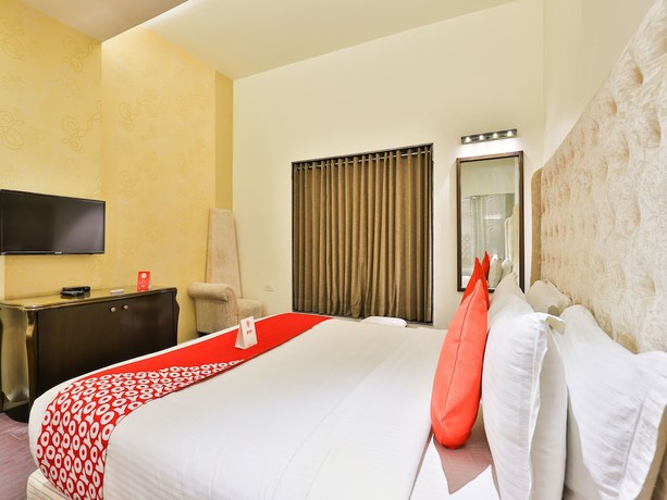 Imagen de la habitación del Hotel OYO 13479 Grand Nakshatra. Foto 6