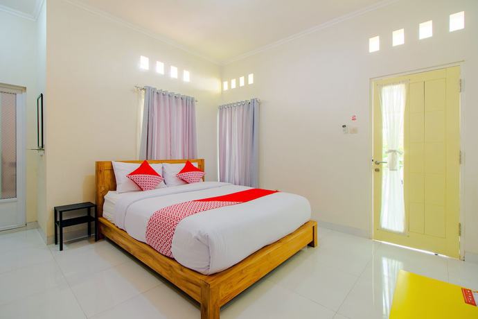 Imagen de la habitación del Hotel OYO 1355 Griya Wismono Homestay. Foto 7