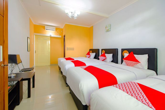 Imagen de la habitación del Hotel OYO 1355 Griya Wismono Homestay. Foto 8