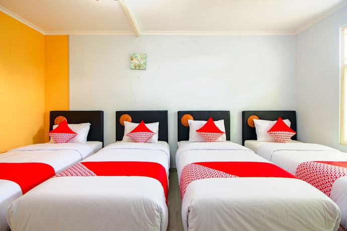 Imagen de la habitación del Hotel OYO 1355 Griya Wismono Homestay. Foto 11