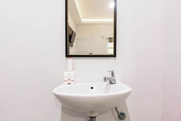 Imagen de la habitación del Hotel OYO 1359 Evergreen Homestay. Foto 3