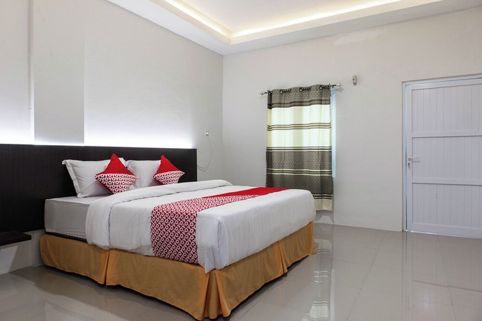 Imagen de la habitación del Hotel OYO 1359 Evergreen Homestay. Foto 4