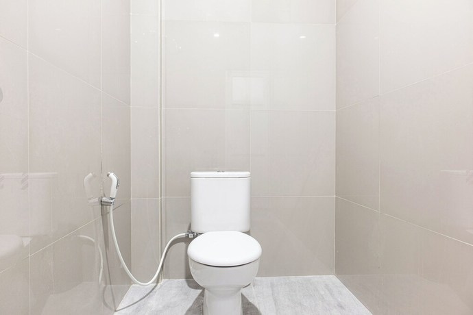 Imagen de la habitación del Hotel OYO 1359 Evergreen Homestay. Foto 6