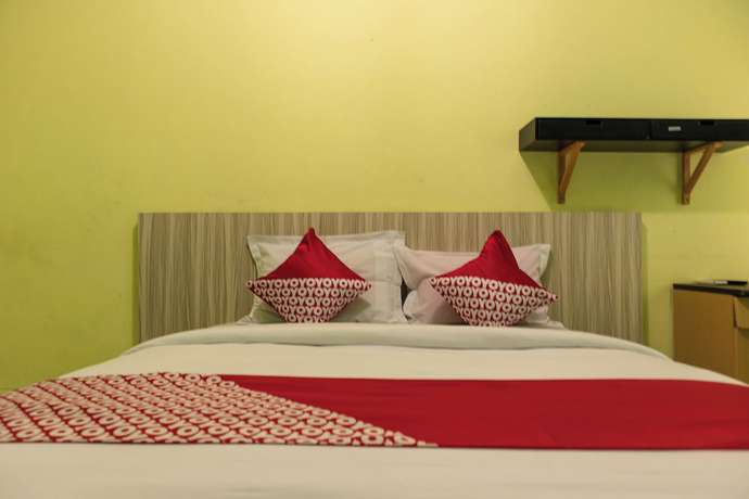 Imagen de la habitación del Hotel OYO 1359 Evergreen Homestay. Foto 7