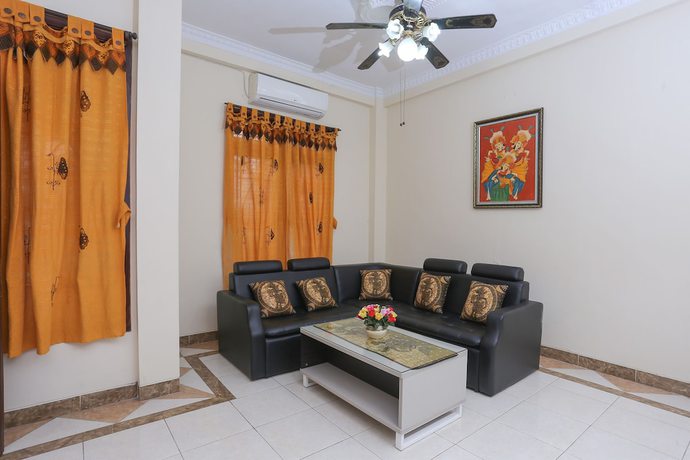Imagen de los interiores del Hotel OYO 1366 Kayoman Family Homestay. Foto 17