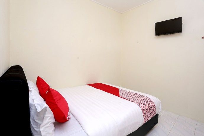 Imagen de la habitación del Hotel OYO 1366 Kayoman Family Homestay. Foto 4