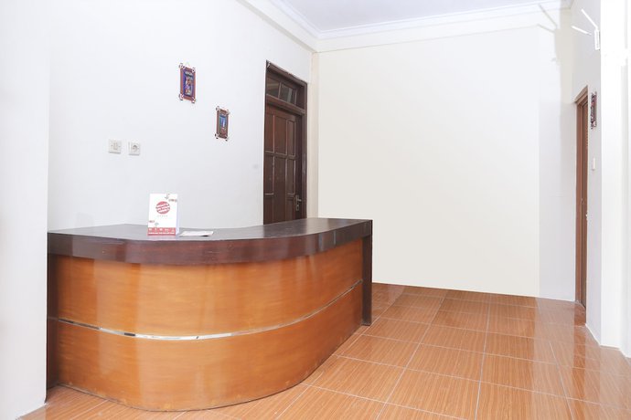 Imagen de los interiores del Hotel OYO 1366 Kayoman Family Homestay. Foto 18
