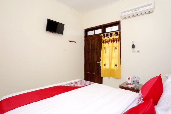 Imagen de la habitación del Hotel OYO 1366 Kayoman Family Homestay. Foto 9