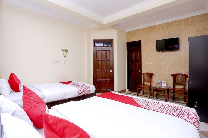 Imagen de la habitación del Hotel OYO 1366 Kayoman Family Homestay. Foto 15