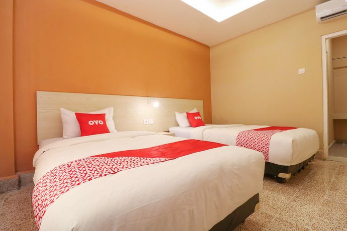 Imagen de la habitación del Hotel OYO 1384 Pulau Bali. Foto 7