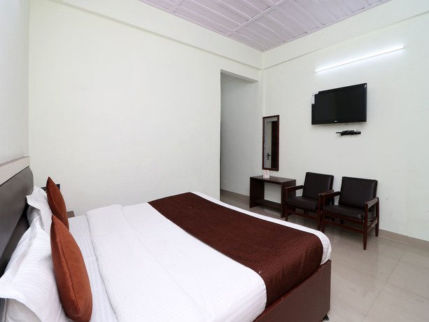 Imagen de la habitación del Hotel OYO 13908 India. Foto 11