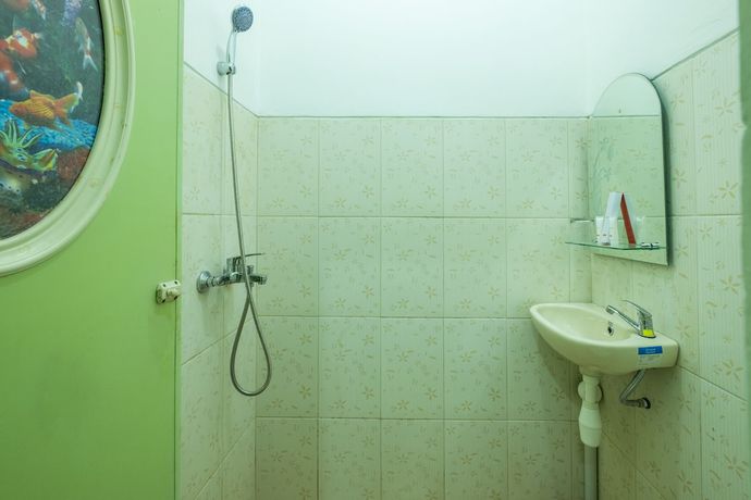 Imagen de la habitación del Hotel OYO 1399 Cemara Residence Syariah. Foto 3