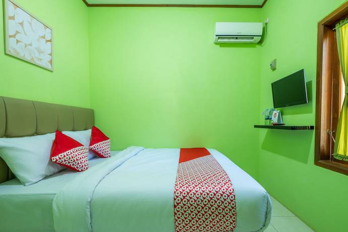 Imagen de la habitación del Hotel OYO 1399 Cemara Residence Syariah. Foto 4