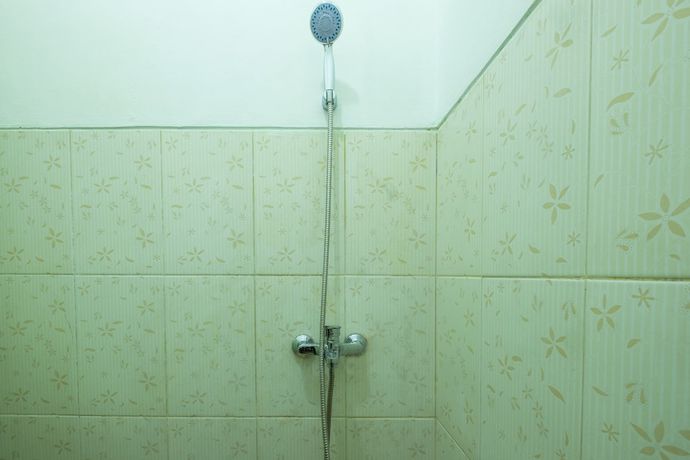 Imagen de la habitación del Hotel OYO 1399 Cemara Residence Syariah. Foto 5