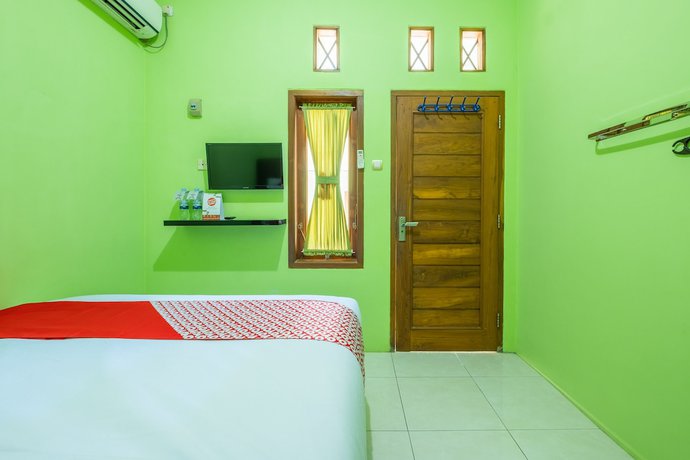 Imagen de la habitación del Hotel OYO 1399 Cemara Residence Syariah. Foto 6