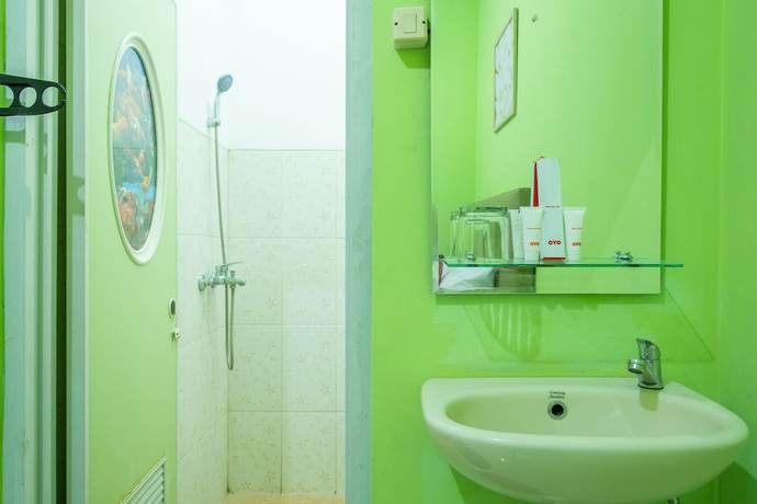 Imagen de la habitación del Hotel OYO 1399 Cemara Residence Syariah. Foto 7