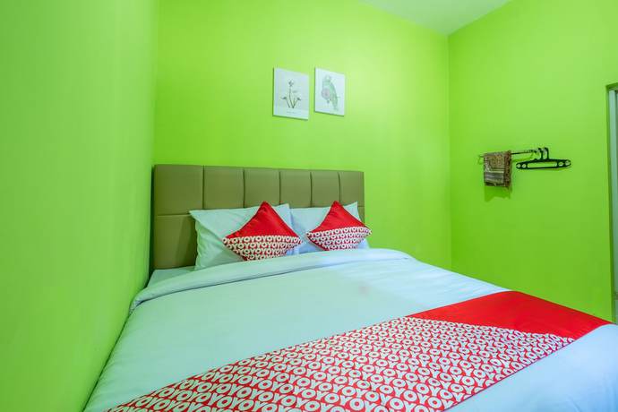 Imagen de la habitación del Hotel OYO 1399 Cemara Residence Syariah. Foto 8