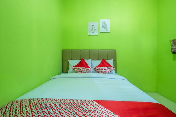 Imagen de la habitación del Hotel OYO 1399 Cemara Residence Syariah. Foto 12