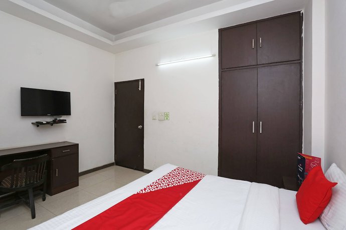 Imagen de la habitación del Hotel OYO 14015 Diamond Stays. Foto 2