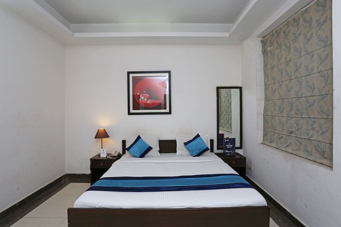 Imagen de la habitación del Hotel OYO 14015 Diamond Stays. Foto 3