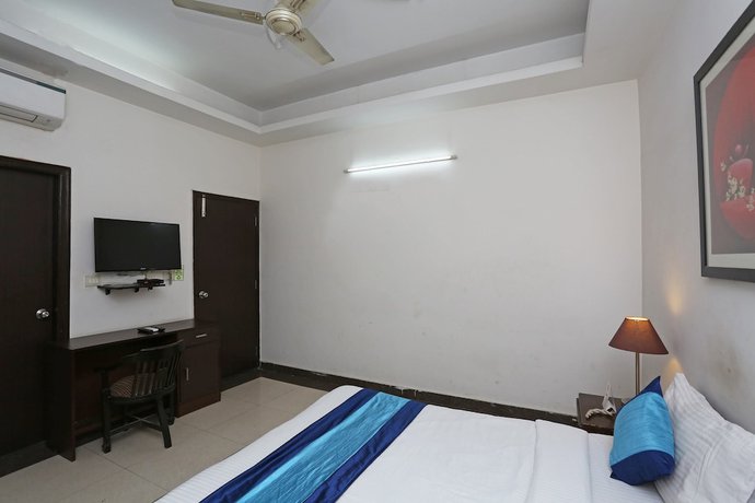 Imagen de la habitación del Hotel OYO 14015 Diamond Stays. Foto 6