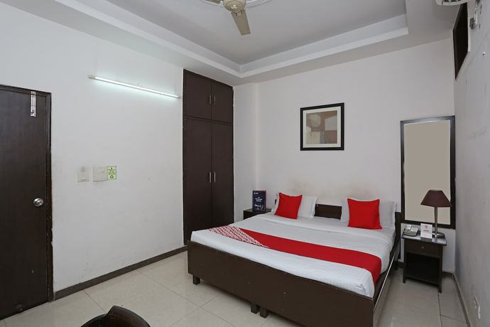 Imagen de la habitación del Hotel OYO 14015 Diamond Stays. Foto 8