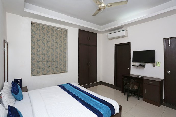 Imagen de la habitación del Hotel OYO 14015 Diamond Stays. Foto 11