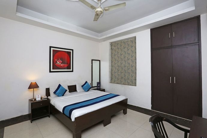 Imagen de la habitación del Hotel OYO 14015 Diamond Stays. Foto 12