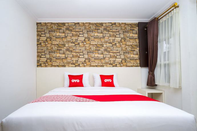 Imagen de la habitación del Hotel OYO 1411 Djakarta Syariah. Foto 2
